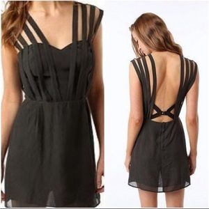 Strappy & flowy black mini dress